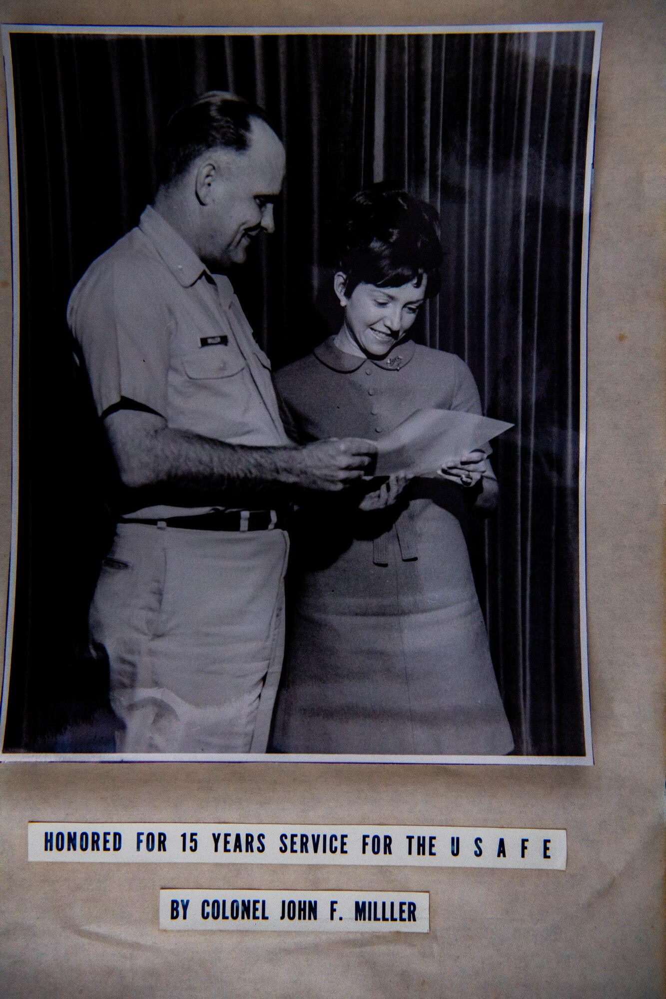 Hilde is presented with an award by Col John F. Miller for 15 years of service in 1969.