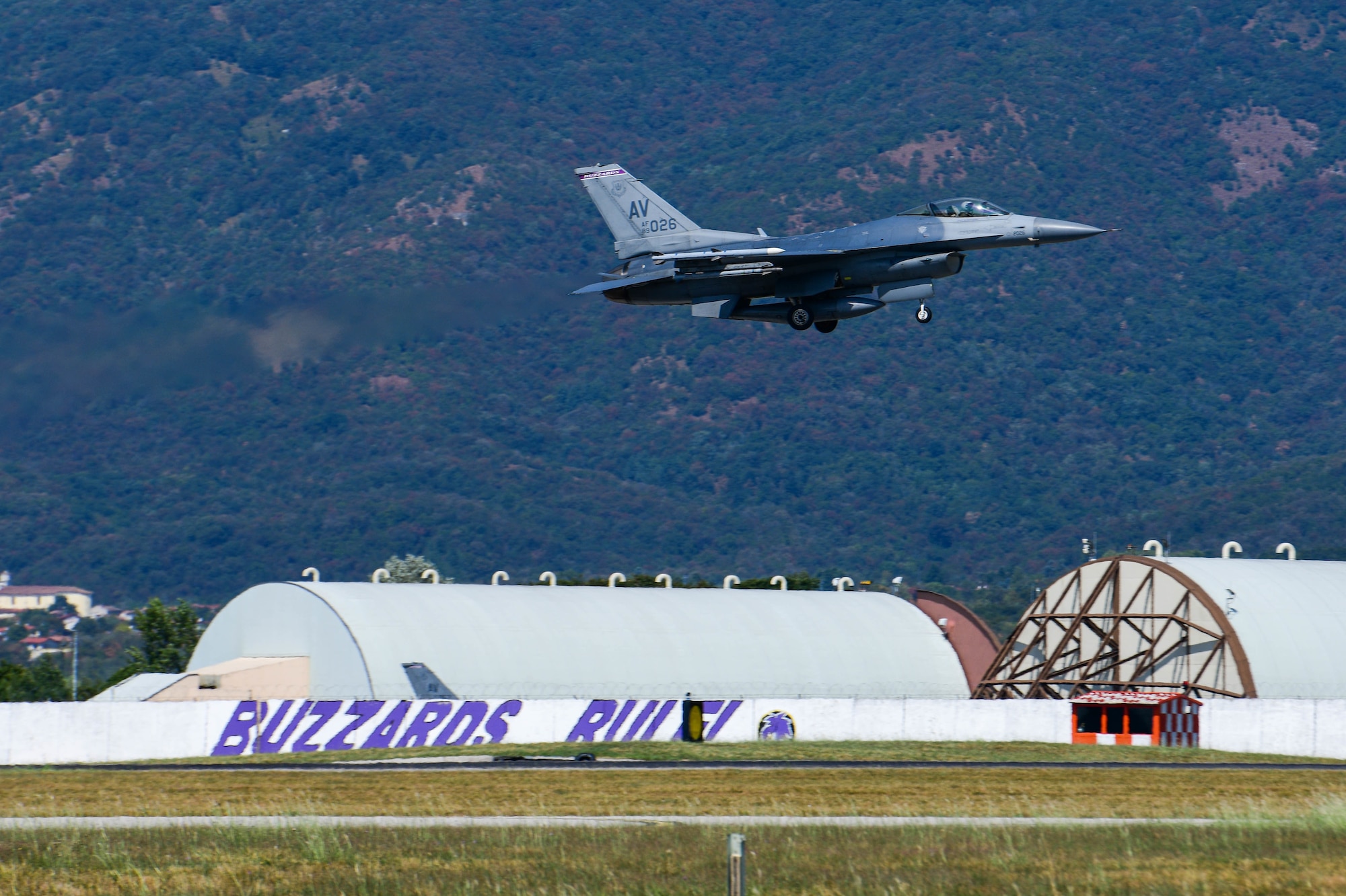 A U.S. Air Force F-16 Fighting Falcon assigned to the 510th Fighter Squadron performs a low pass training sortie at Aviano Air Base, Italy, Aug. 8, 2022. The 510th FS provides combat air power to U.S. and NATO combatant commanders in order to meet national security objectives. (U.S. Air Force photo by Senior Airman Brooke Moeder)