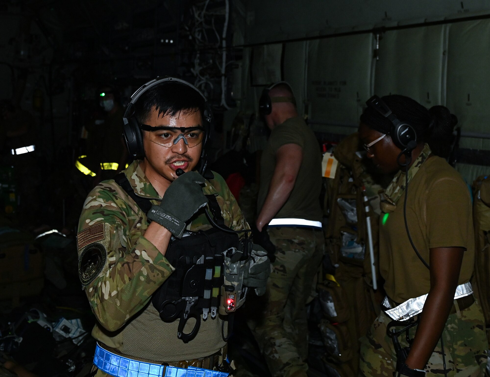 U.S. Air Force Master Sgt. John Garcia, a 379th Expeditionary Air Evacuation Squadron aeromedical technician, coordinates the placement of arriving patients Aug 4, 2022 at Al Udeid Airbase, Qatar. Proper placement of causalities is crucial during aerial evacuations. (U.S. Air National Guard photo by Master Sgt. Michael J. Kelly)