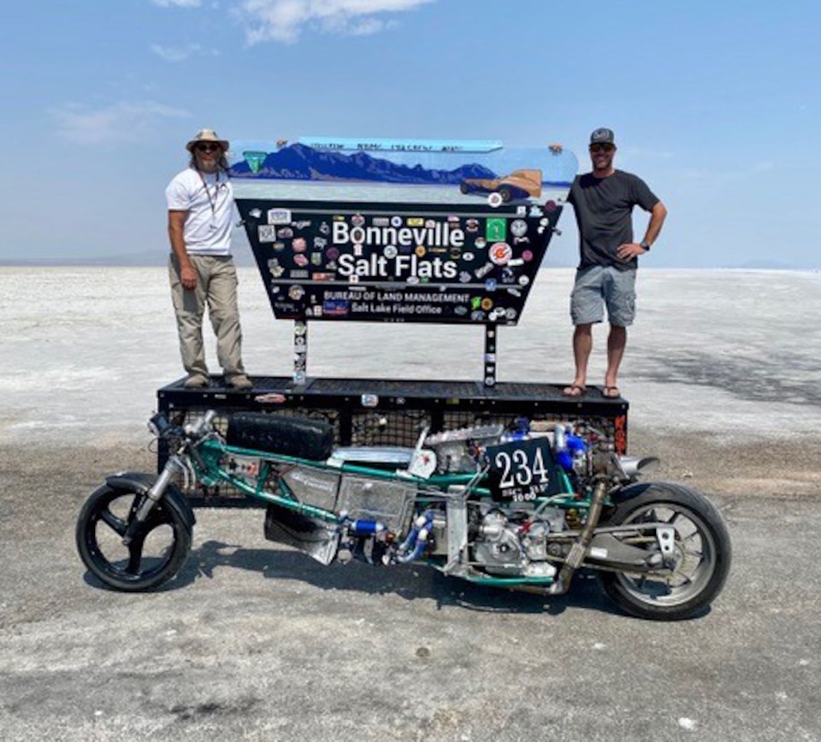 Jaron Tyner with his teammate and cousin Tyrell Marlow and their custom-built motorcycle, the Coconut Express