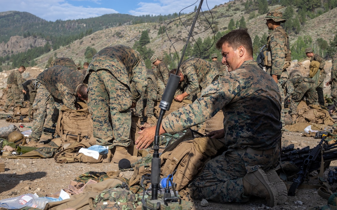 U.S. Marines with 1st Battalion, 24th Marine Regiment, 4th Marine Division, Marine Forces Reserve, conduct gear inspections after finishing Mountain Training Exercise 4-22 at Marine Corps Mountain Warfare Training Center, Bridgeport, Calif., July 28, 2022. MTX 4-22 allowed reserve Marines to participate in mountain warfare operations for realistic combat training to facilitate increased readiness for the Marine Forces Reserve. (U.S. Marine Corps photo by Cpl. Jonathan L. Gonzalez)