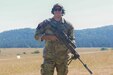 Sgt. Dalton Weist of 1st Battalion, 109th Infantry Regiment, 2nd Infantry Brigade Combat Team poses for a photo during the European Best Sniper Competition at Hohenfels Training Area, Germany, Aug. 5, 2022.