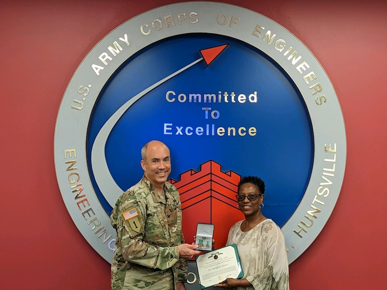 Dr. Carolyn D. Harris receives the Team Award Civilian Service Commendation Medal