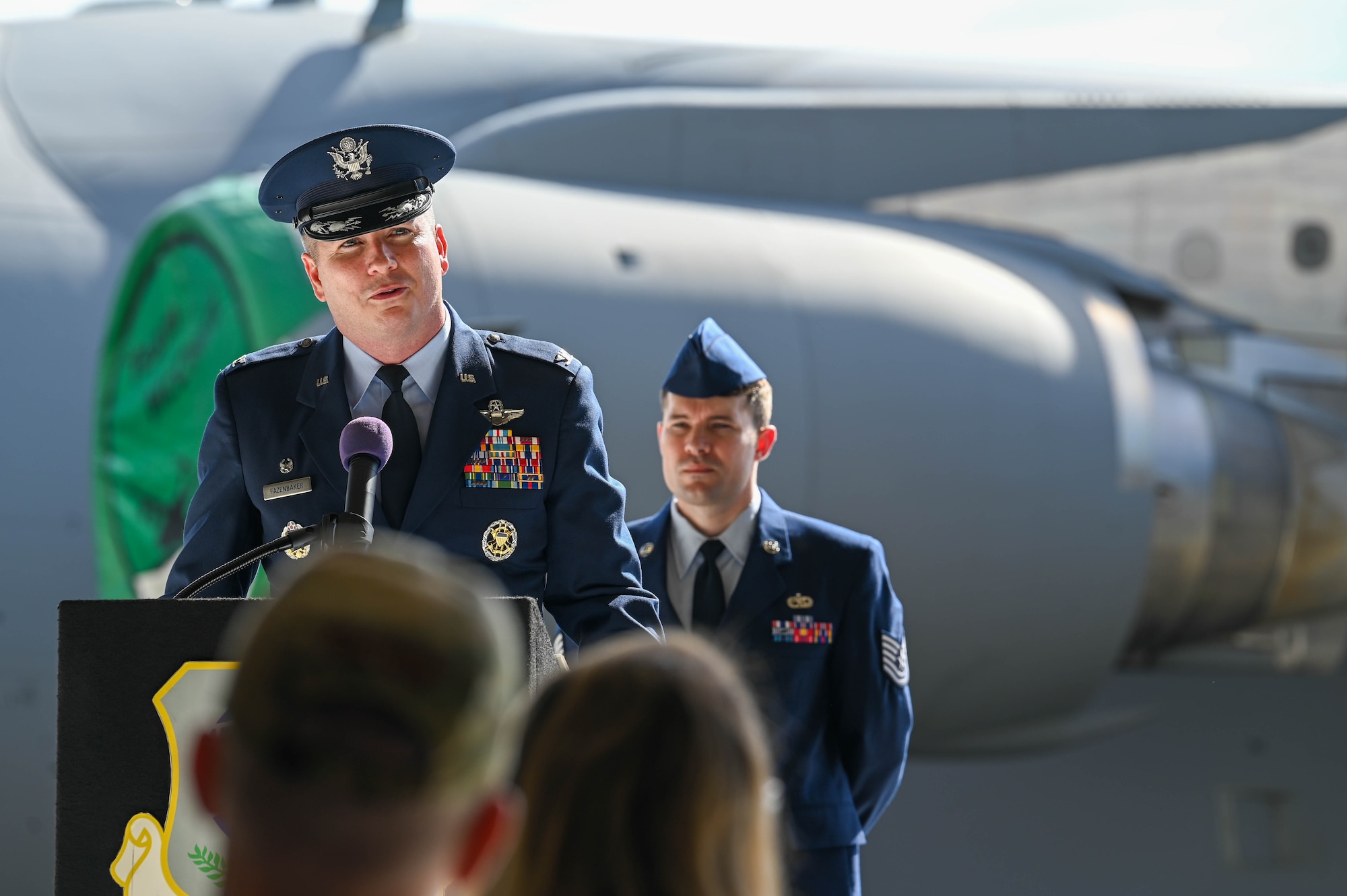 U.S. Air Force Col. David Fazenbaker, commander of the 62d Airlift Wing, gives a speech during the 62d Maintenance Group assumption of command ceremony at Joint Base Lewis-McChord, Washington, Aug. 5, 2022. The 62d MXG provides cargo, passenger, and aerial delivery for Joint Base Lewis-McChord’s power projection platform, to include operating the Air Mobility Command Passenger Terminal at Seattle-Tacoma International Airport. (U.S. Air Force photo by Airman 1st Colleen Anthony)