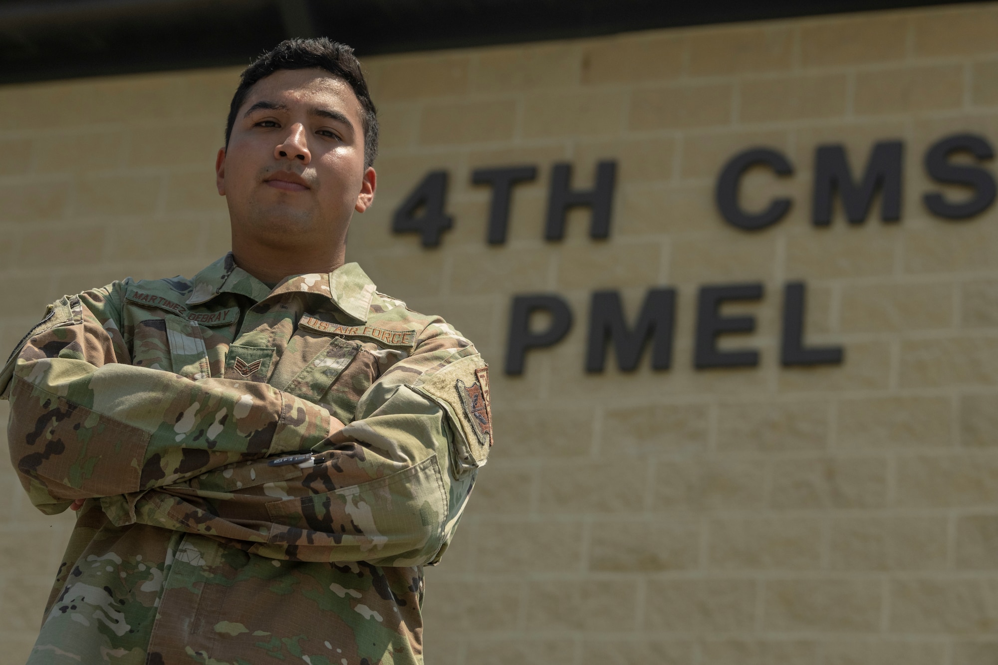 Senior Airman Manuel Martinez Dubray, 4th Component Maintenance Squadron precision measurement equipment laboratory electronics technician, poses for a photo at Seymour Johnson Air Force Base, North Carolina, Aug. 3, 2022. Martinez Dubray was recognized as this week's Wingman Wednesday for his drive, work ethic and dedication to his shop. (U.S. Air Force photo by Senior Airman Kevin Holloway)