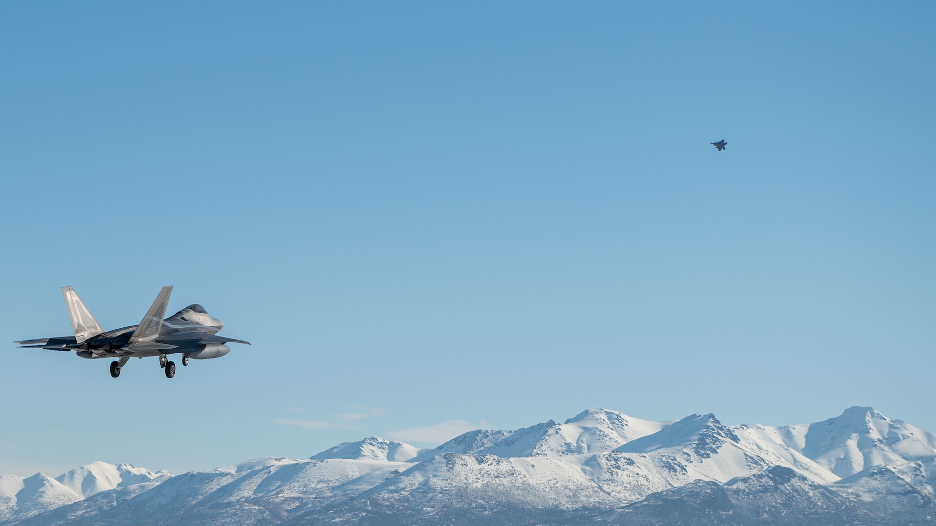 F-22 Raptor soars with other aviators during 25th anniversary