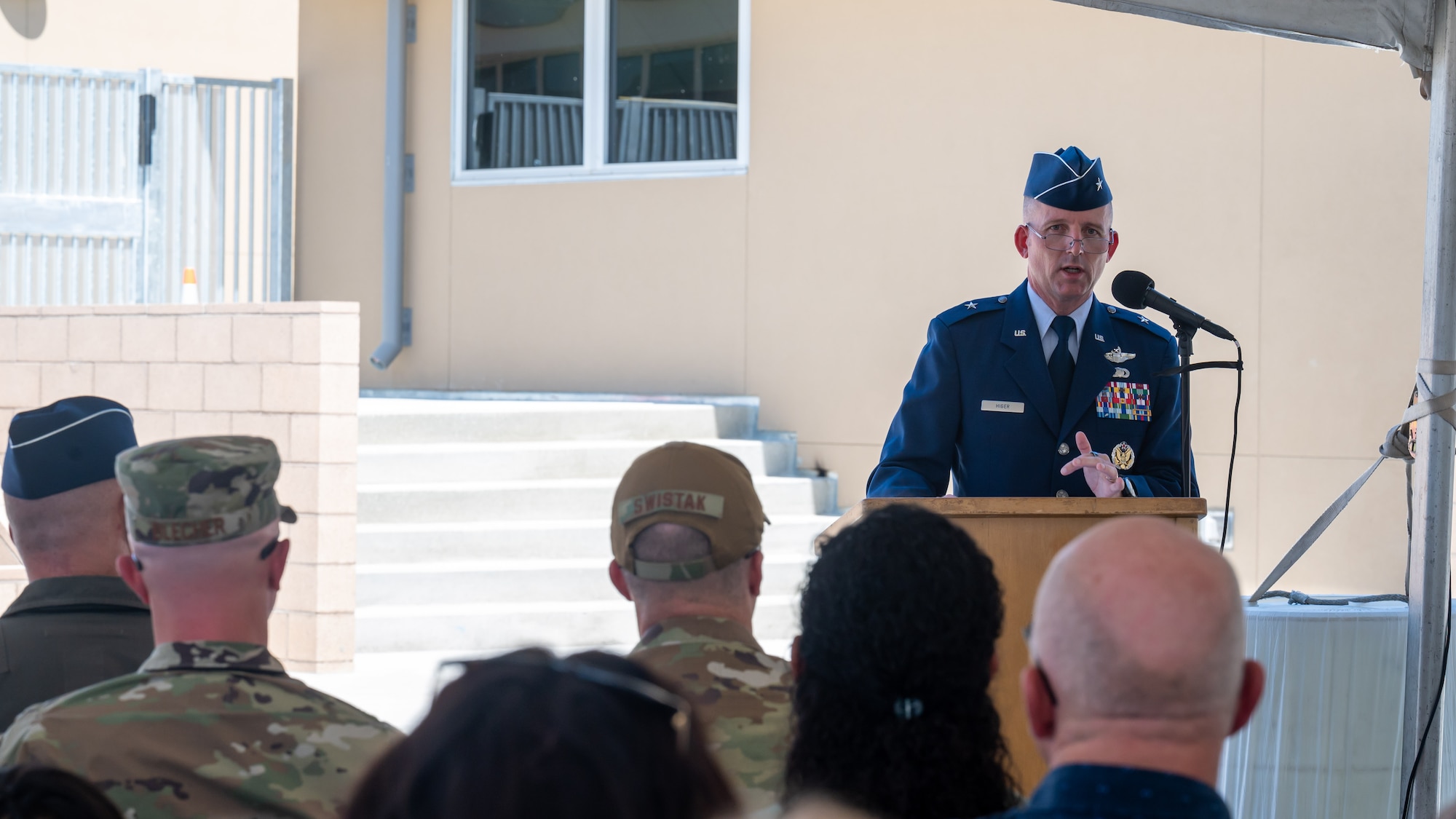 Brig. Gen. Matthew Higer, 412th Test Wing Commander, provides his remarks during the ribbon cutting event for the Desert Jr./Sr. High School reopening on Edwards Air Force Base, California, Aug. 9. (Air Force photo by Giancarlo Casem)
