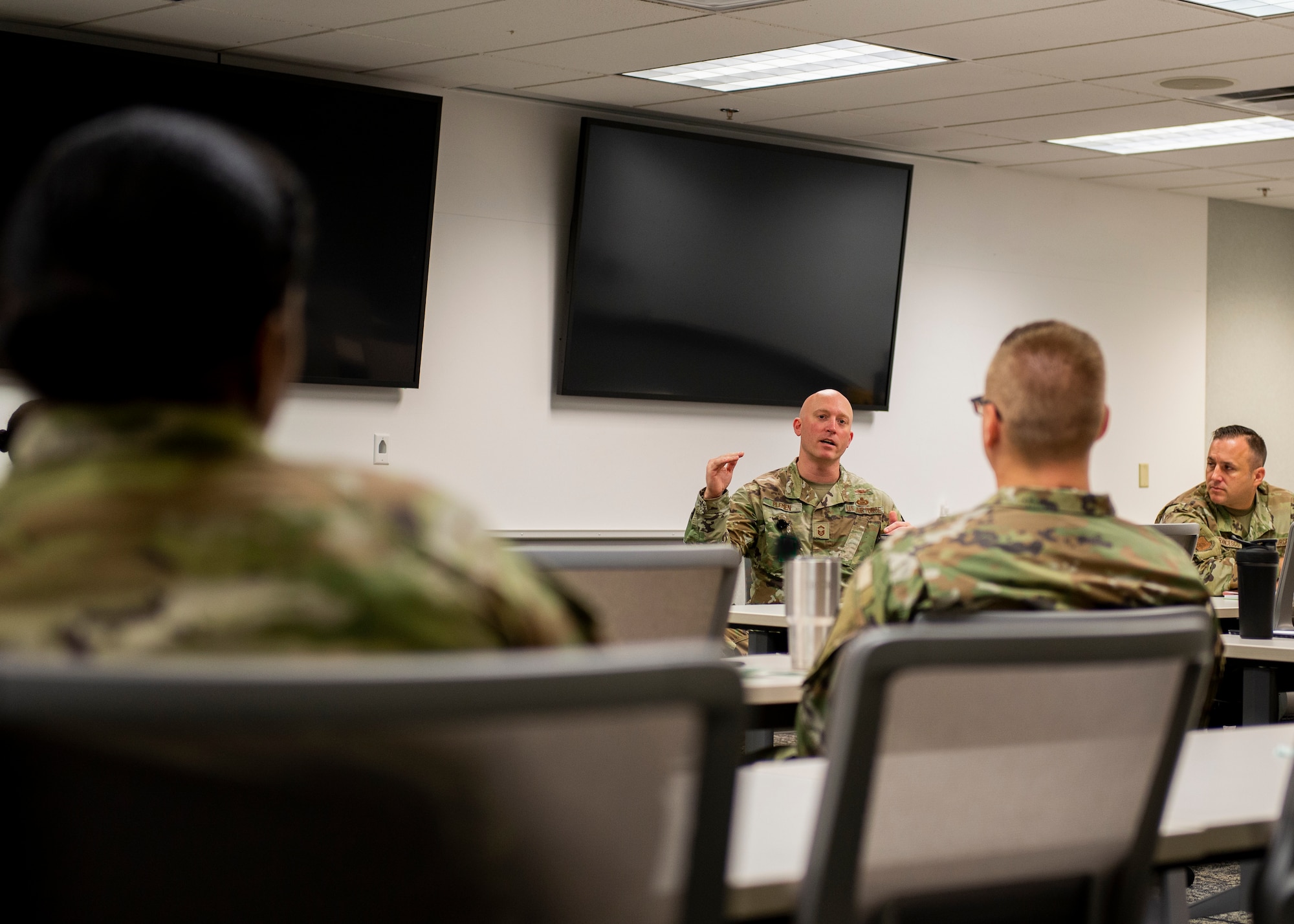 Senior Master Sgt. David Plemen, Signals Analysis Squadron senior enlisted leader, addresses the class during the National Air and Space Intelligence Center SEL Top-Off on July 7, 2022, at Wright-Patterson Air Force Base, Ohio. The two-day professional development course is a continuation of the Non Commissioned Officers and Senior Non Commissioned Officers professional enchantment seminar course offered at the Wright-Paterson Air Force Base personal development center. (U.S. Air Force photo by Staff Sgt. Samuel Earick)