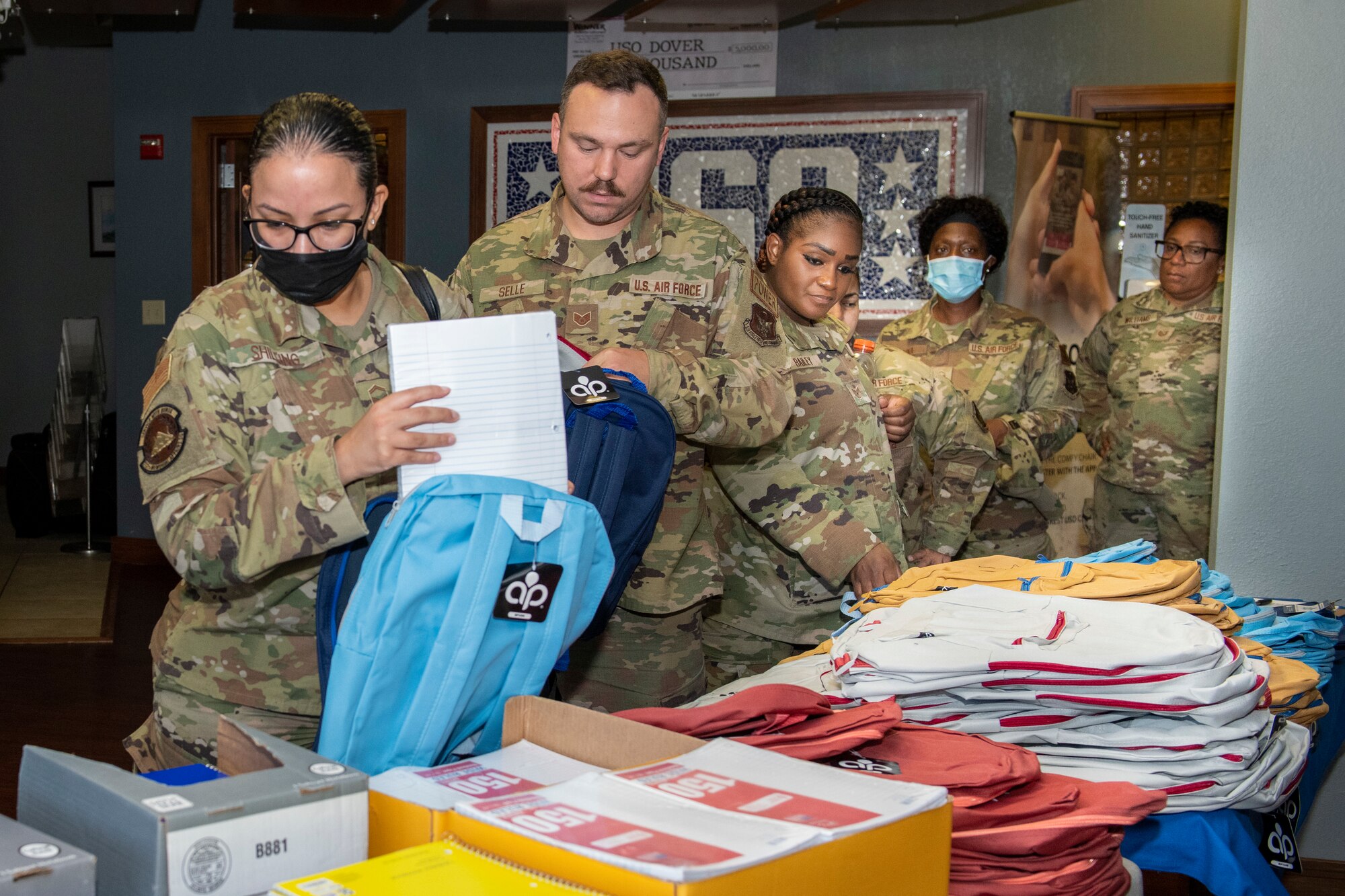 The 512th Military and Family Readiness Center hosted the Back-to-School Brigade at the USO Community Center, Dover Air Force Base, Del., Aug. 7, 2022. Reserve Citizen Airmen received donated backpacks and supplies for their families' upcoming school year.
