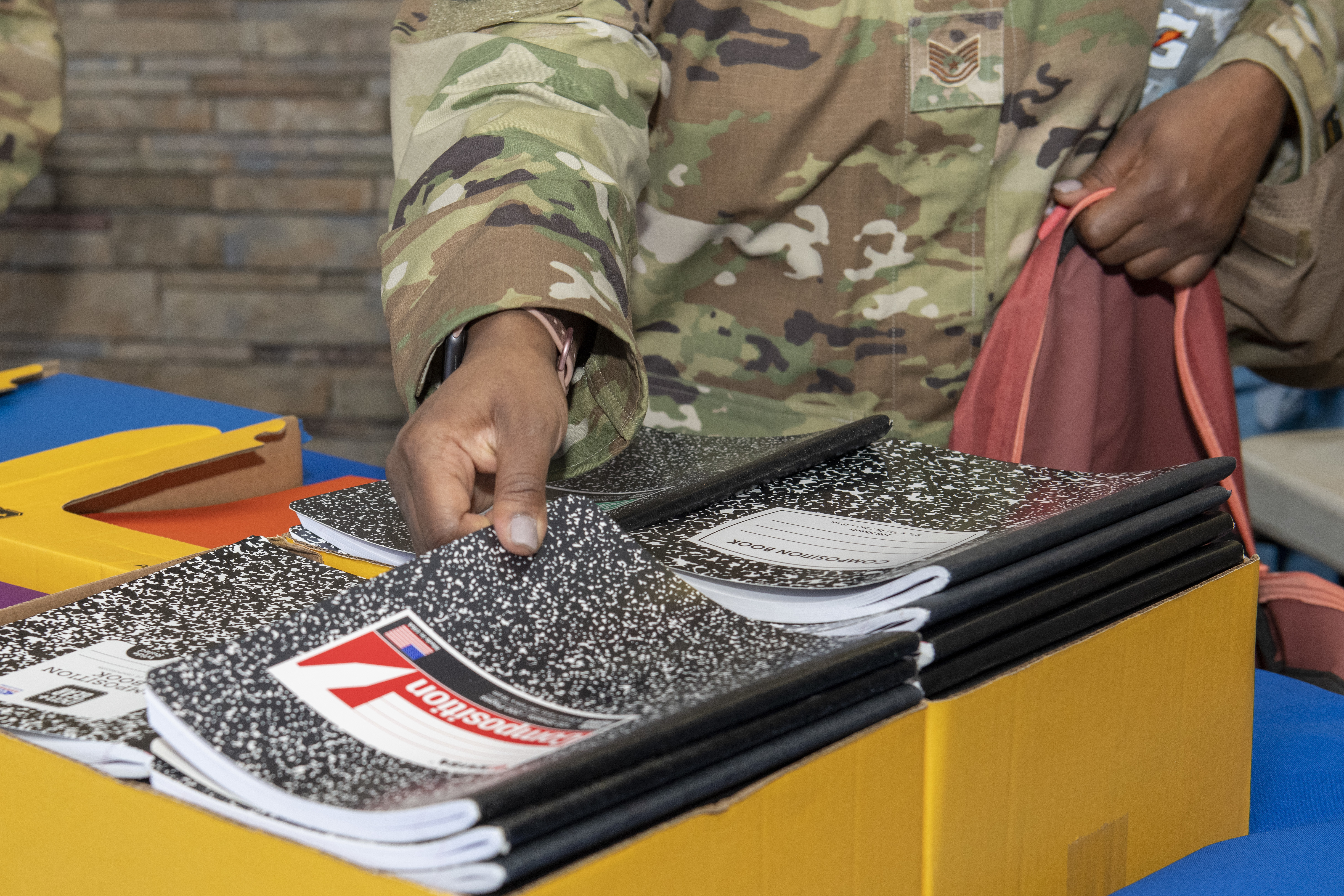 The 512th Military and Family Readiness Center hosted the Back-to-School Brigade at the USO Community Center, Dover Air Force Base, Del., Aug. 7, 2022. Reserve Citizen Airmen received donated backpacks and supplies for their families' upcoming school year.