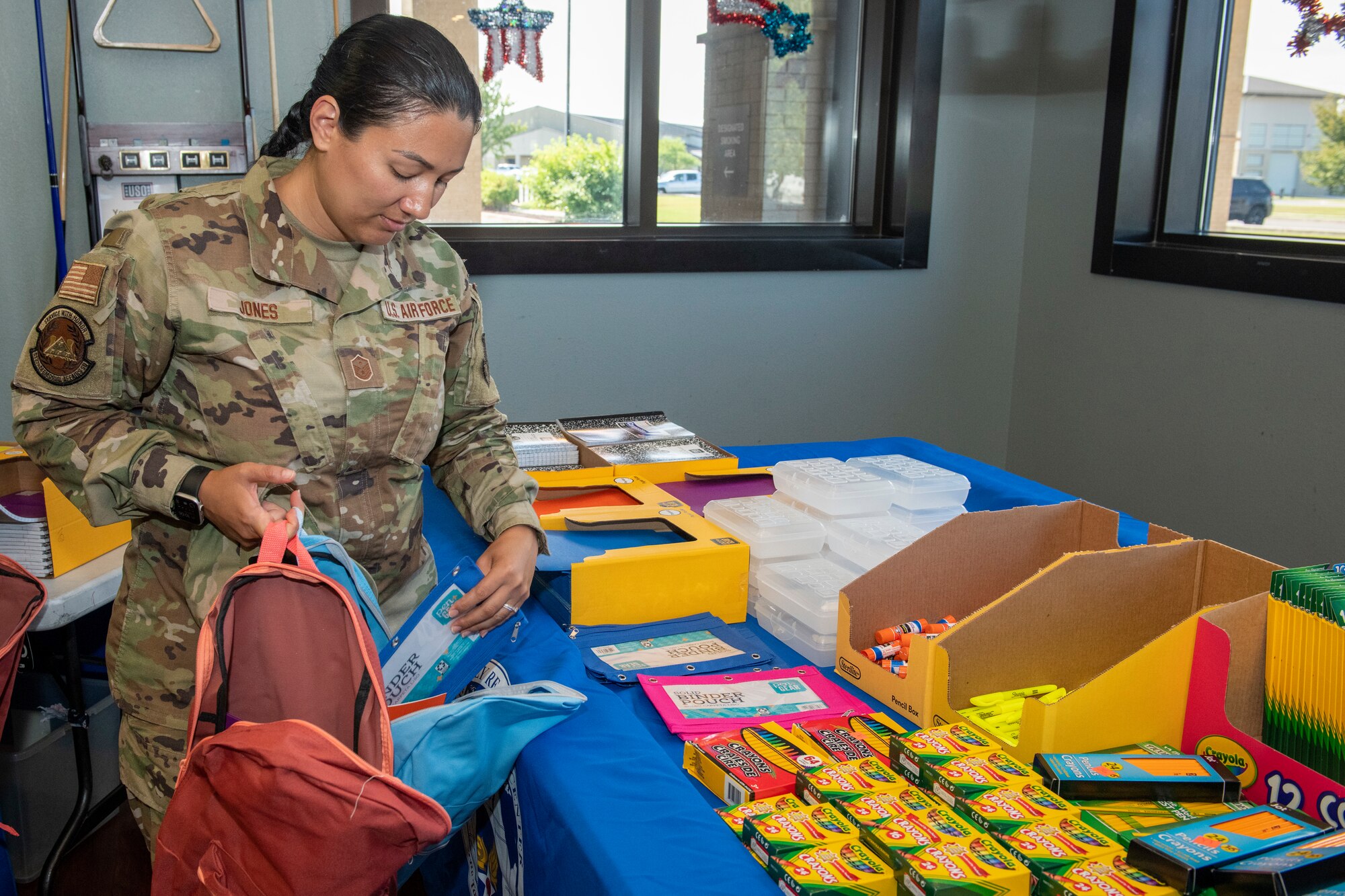 The 512th Military and Family Readiness Center hosted the Back-to-School Brigade at the USO Community Center, Dover Air Force Base, Del., Aug. 7, 2022. Reserve Citizen Airmen received donated backpacks and supplies for their families' upcoming school year.