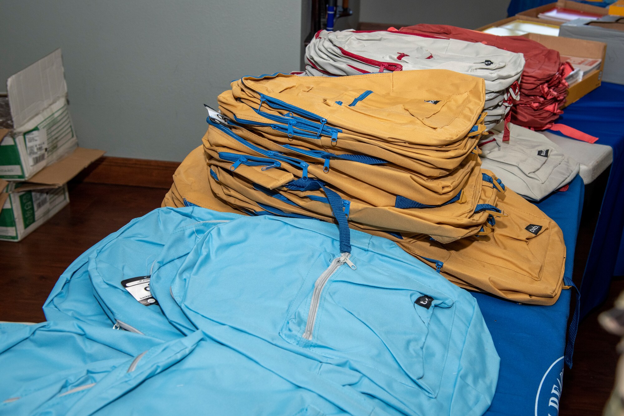 The 512th Military and Family Readiness Center hosted the Back-to-School Brigade at the USO Community Center, Dover Air Force Base, Del., Aug. 7, 2022. Reserve Citizen Airmen received donated backpacks and supplies for their families' upcoming school year.