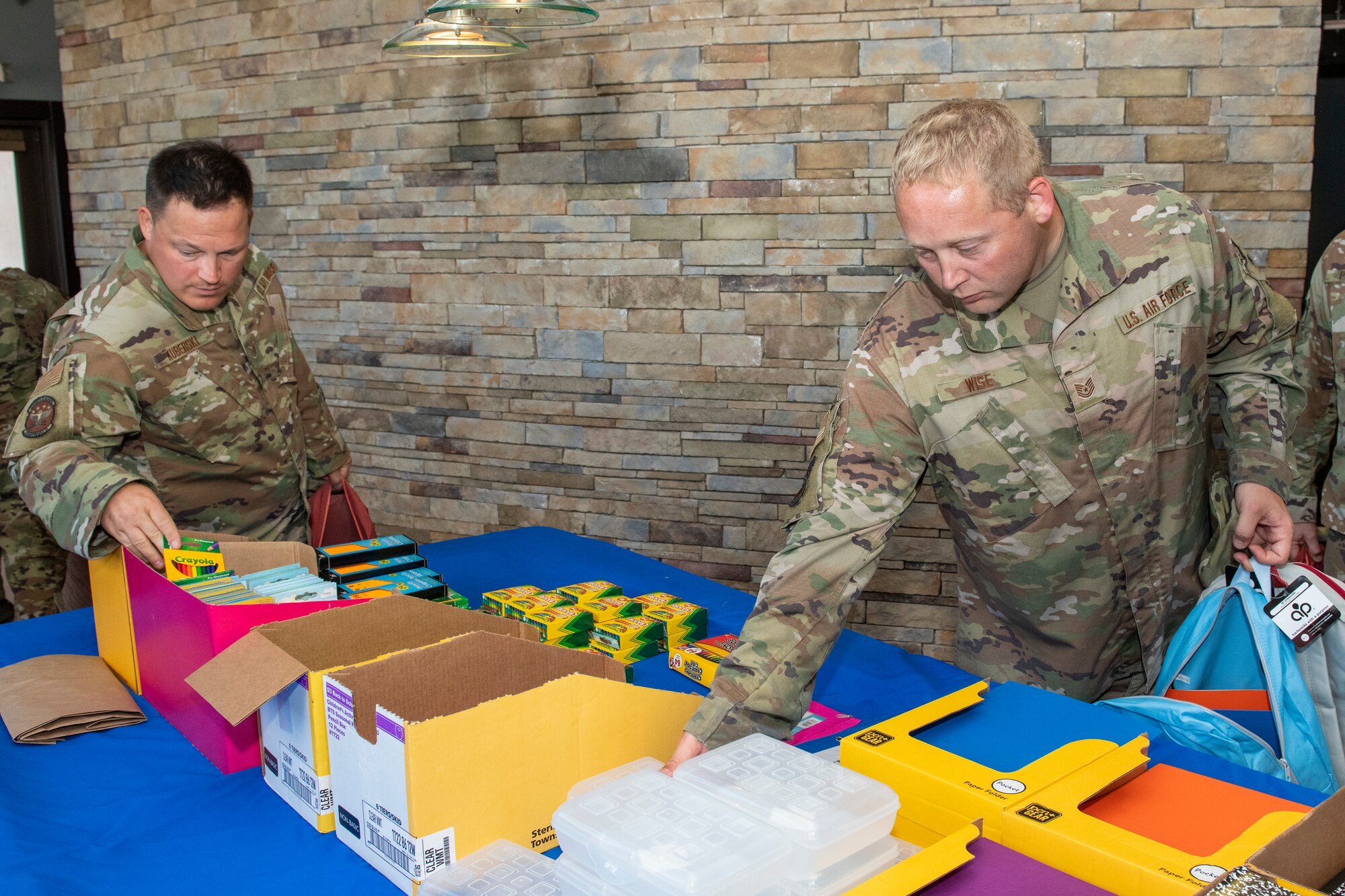 The 512th Military and Family Readiness Center hosted the Back-to-School Brigade at the USO Community Center, Dover Air Force Base, Del., Aug. 7, 2022. Reserve Citizen Airmen received donated backpacks and supplies for their families' upcoming school year.