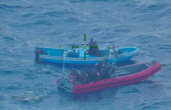The Coast Guard Cutter Joseph Tezanos small boat crew recovers 13 bales (1,653 pounds) of cocaine jettisoned from a drug smuggling vessel that was interdicted near Puerto Rico Aug. 3, 2022.
