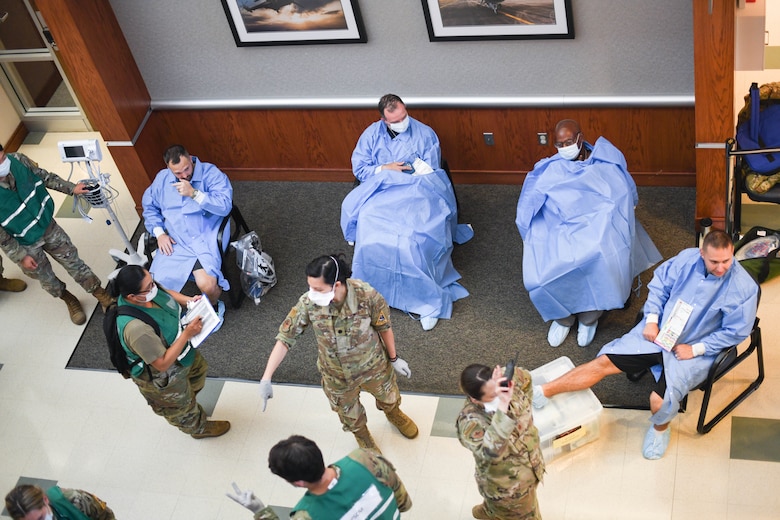 The 61st Medical Squadron bring patients into the clinic for further treatment and diagnostics.
