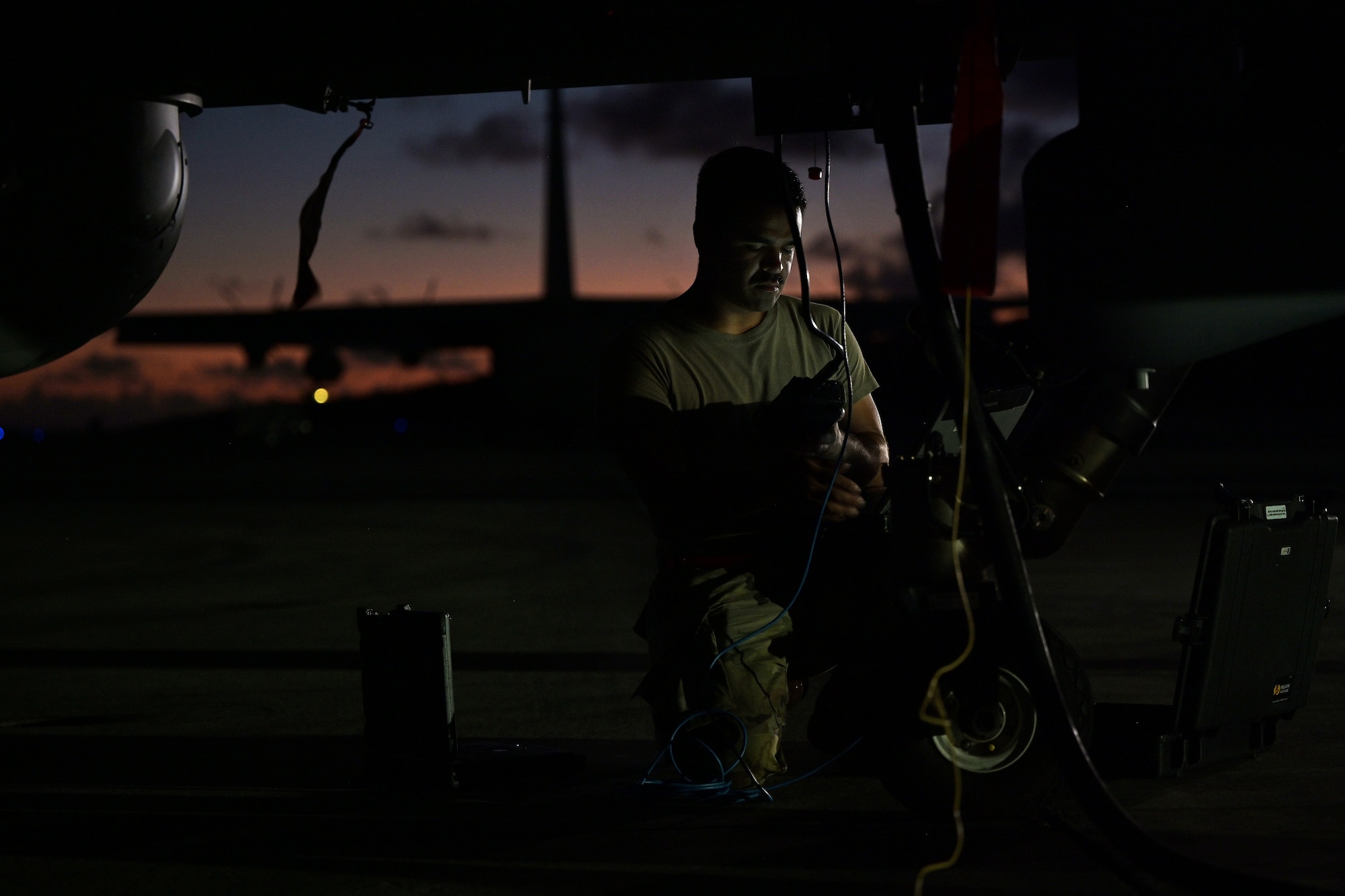 U.S. Air Force Senior Airman Gabriel Peralta, 29th Aircraft Maintenance Squadron avionics specialist, conducts pre-flight checks on an MQ-9 Reaper during Rim of the Pacific (RIMPAC) 2022 July 26, 2022, at Marine Corps Air Station Kaneohe Bay, Hawaii.