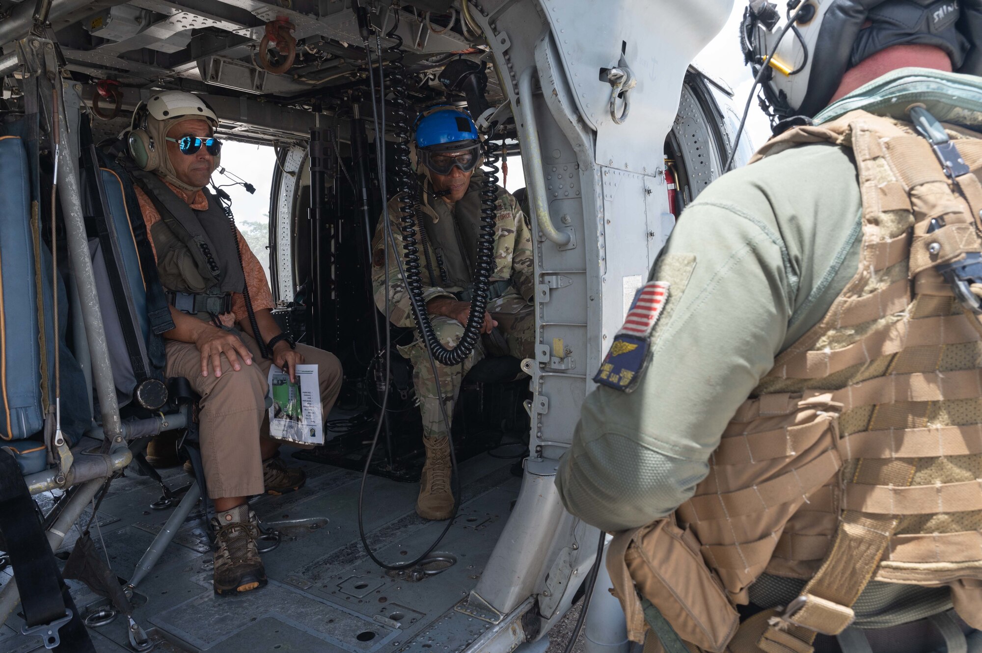 U.S. Air Force Chief of Staff Gen. CQ Brown, Jr. is given a safety brief by U.S. Navy Helicopter Sea Combat Squadron 25 personnel at Northwest Field, Guam, Aug. 7, 2022.