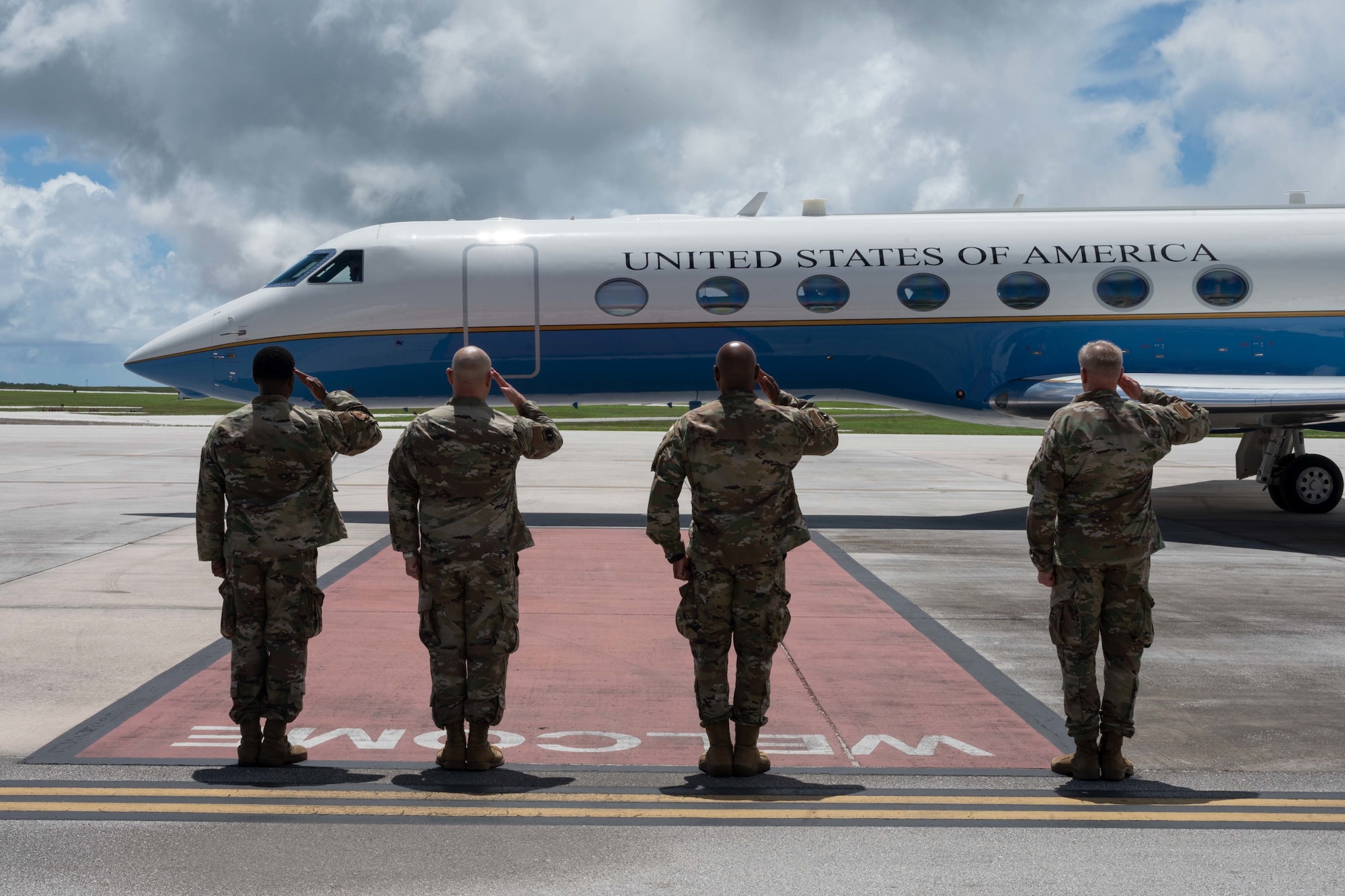 Base leadership salute U.S. Air Force Chief of Staff Gen. CQ Brown, Jr. as he departs Andersen Air Force Base, Guam, Aug. 7, 2022.