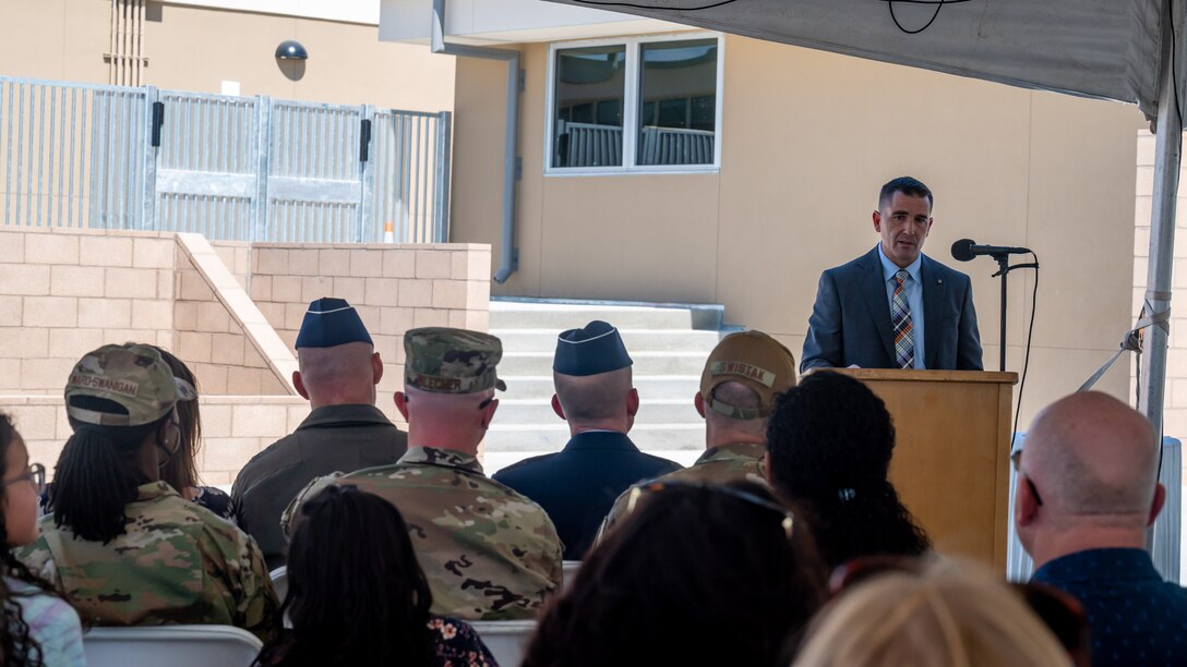 Kevin Cordes, Muroc Joint Unified School District Superintendent, provides his remarks during the ribbon cutting event for the Desert Jr./Sr. High School reopening on Edwards Air Force Base, California, Aug. 9. (Air Force photo by Giancarlo Casem)
