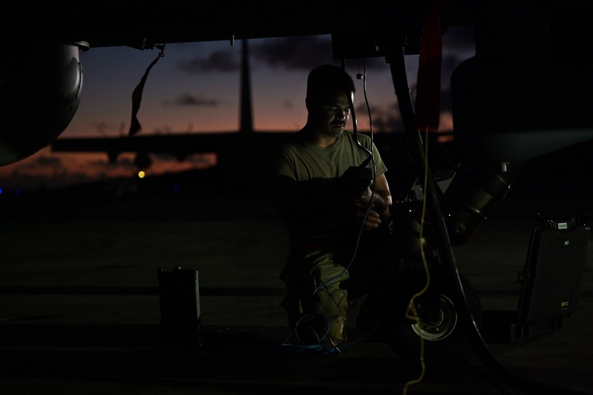 U.S. Air Force Senior Airman Gabriel Peralta, 29th Aircraft Maintenance Squadron avionics specialist, conducts pre-flight checks on an MQ-9 Reaper during Rim of the Pacific (RIMPAC) 2022 July 26, 2022, at Marine Corps Air Station Kaneohe Bay, Hawaii.