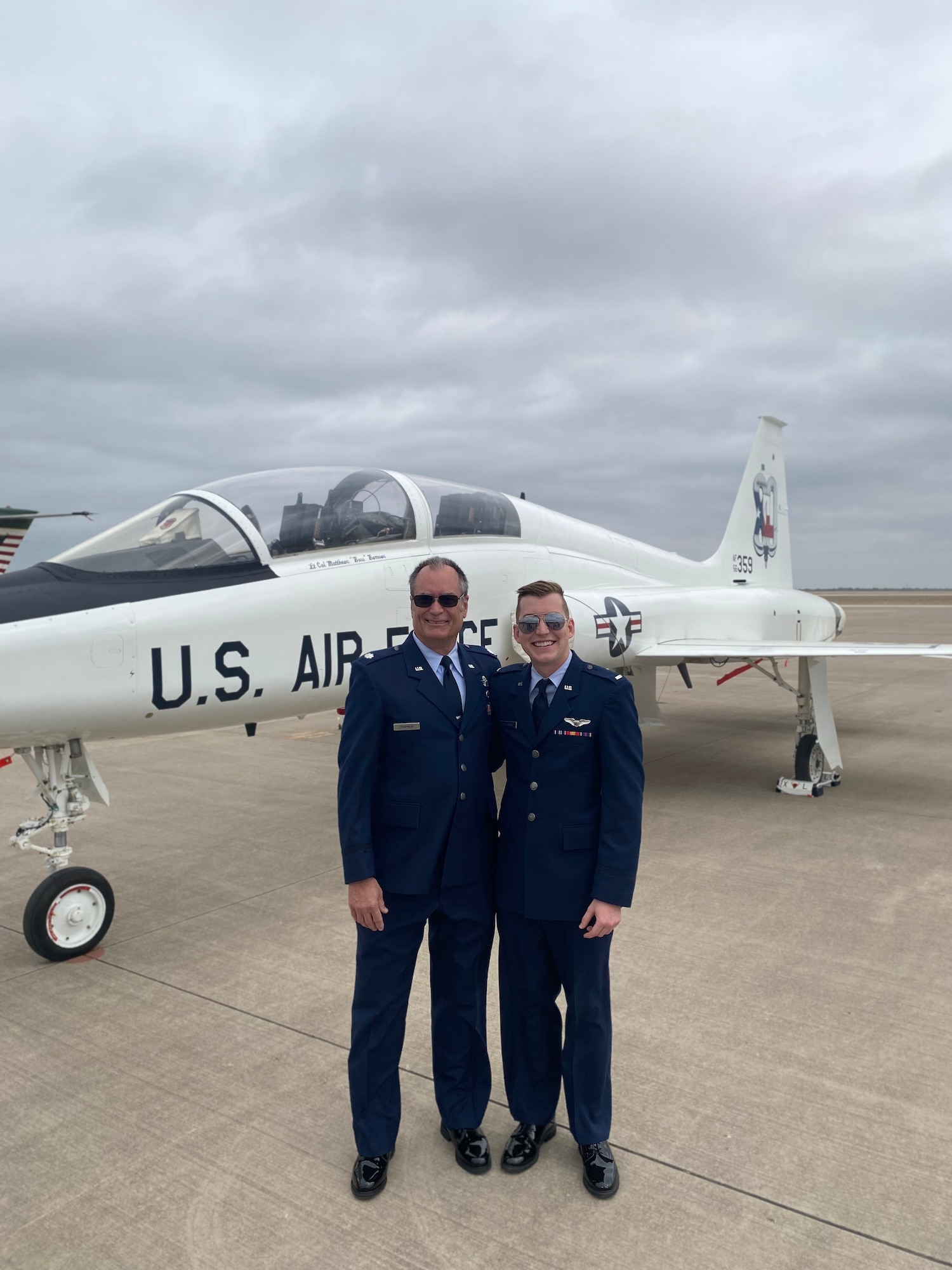 U.S. Air Force 1st Lt. Chad Chapman (right), 47th Student Squadron T-38 Talon student pilot, stands in front of a T-38 Talon with his uncle, retired Lt. Col. James Chapman (left) at Laughlin Air Force Base, Texas. (U.S. Air Force courtesy photo)