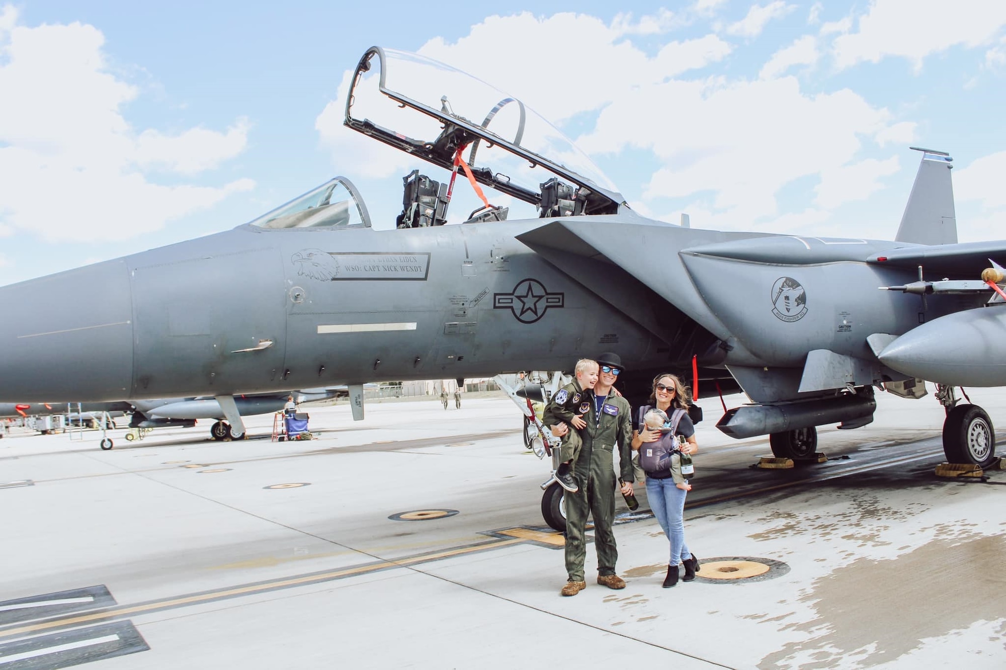 U.S. Air Force 1st Lt. chad Chapman's oldest brother, Capt. Chase Chapman, poses with his famly. (U.S. Air Force courtesy photo)