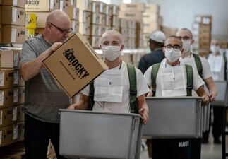 220702-N-PW480-0183 GREAT LAKES, Ill. (July 2, 2022) Naval Reserve Officers Training Corps (NROTC) New Student Indoctrination (NSI) 2022 Cycle 2 midshipman candidates receive boots during uniform issue at Recruit Training Command (RTC), July 2. Upon completion of NSI, the candidates will start their freshman year of the NROTC program at colleges and universities nationwide this fall. NSI is an indoctrination program hosted at RTC, and provides midshipmen with a common military training orientation. NSI provides basic training in five warfighting fundamentals – firefighting, damage control, seamanship, watchstanding and small arms handling and marksmanship – to begin creating basically trained and smartly disciplined future Navy and Marine Corps officers. NROTC is overseen by Commander, Naval Service Training Command (NSTC), Rear Adm. Jennifer S. Couture, which supports naval accessions training for 98 percent of the Navy’s new officers and enlisted Sailors. (U.S. Navy photo by Mass Communication Specialist 2nd Class Nikita Custer)