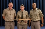 From L to R) U.S. Army Command Sgt. Maj. Jason Peterson, Chicago Recruiting Battalion command sergeant major; U.S. Army Sgt. 1st Class Renee Barton, policy NCOIC, J-3/5/7; and U.S. Army Lt. Col. Shane Doolan. Chicago Recruiting Battalion commander, pose for a photo during an awards ceremony at USMEPCOM, Aug. 9.