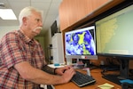 Mark Starnes, emergency manager for Naval Medical Center Camp Lejeune monitors weather radars for the Camp Lejeune area.  Part of the responsibility of the Emergency Management Department is to monitor weather conditions which could hinder safety and operations of the Medical Center.