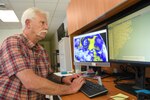 Mark Starnes, emergency manager for Naval Medical Center Camp Lejeune monitors weather radars for the Camp Lejeune area.  Part of the responsibility of the Emergency Management Department is to monitor weather conditions which could hinder safety and operations of the Medical Center.