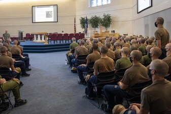 220705-N-ZW825-0278 GREAT LAKES, Ill. (July 5, 2022) A Naval Reserve Officers Training Corps (NROTC) New Student Indoctrination (NSI) midshipman candidate answers a question during a Warrior Toughness class at Recruit Training Command (RTC), July 5. Upon completion of NSI, the candidates will start their freshman year of the NROTC program at colleges and universities nationwide this fall. NSI is an indoctrination program hosted at RTC, and provides midshipmen with a common military training orientation. NSI provides basic training in five warfighting fundamentals – firefighting, damage control, seamanship, watchstanding and small arms handling and marksmanship – to begin creating basically trained and smartly disciplined future Navy and Marine Corps officers. NROTC is overseen by Commander, Naval Service Training Command (NSTC), Rear Adm. Jennifer S. Couture, which supports naval accessions training for 98 percent of the Navy’s new officers and enlisted Sailors. (U.S. Navy photo by Chief Mass Communication Specialist Byron C. Linder)