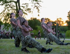 220712-N-PW480-0280 GREAT LAKES, Ill. (July 12, 2022) Naval Reserve Officers Training Corps (NROTC) New Student Indoctrination (NSI) midshipman candidates execute the “body drag” portion of a physical training session at Recruit Training Command (RTC), July 12. Upon completion of NSI, the candidates will start their freshman year of the NROTC program at colleges and universities nationwide this fall. NSI is an indoctrination program hosted at RTC, and provides midshipmen with a common military training orientation. NSI provides basic training in five warfighting fundamentals – firefighting, damage control, seamanship, watchstanding and small arms handling and marksmanship – to begin creating basically trained and smartly disciplined future Navy and Marine Corps officers. NROTC is overseen by Commander, Naval Service Training Command (NSTC), Rear Adm. Jennifer S. Couture, which supports naval accessions training for 98 percent of the Navy’s new officers and enlisted Sailors. (U.S. Navy photo by Mass Communication Specialist 2nd Class Nikita Custer)