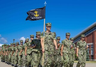 220714-N-PW480-0034 GREAT LAKES, Ill. (July 14, 2022) Naval Reserve Officers Training Corps (NROTC) New Student Indoctrination (NSI) midshipman candidates march in formation during a close order drill graduation rehearsal at Recruit Training Command (RTC), July 14. Upon completion of NSI, the candidates will start their freshman year of the NROTC program at colleges and universities nationwide this fall. NSI is an indoctrination program hosted at RTC, and provides midshipmen with a common military training orientation. NSI provides basic training in five warfighting fundamentals – firefighting, damage control, seamanship, watchstanding and small arms handling and marksmanship – to begin creating basically trained and smartly disciplined future Navy and Marine Corps officers. NROTC is overseen by Commander, Naval Service Training Command (NSTC), Rear Adm. Jennifer S. Couture, which supports naval accessions training for 98 percent of the Navy’s new officers and enlisted Sailors. (U.S. Navy photo by Mass Communication Specialist 2nd Class Nikita Custer)