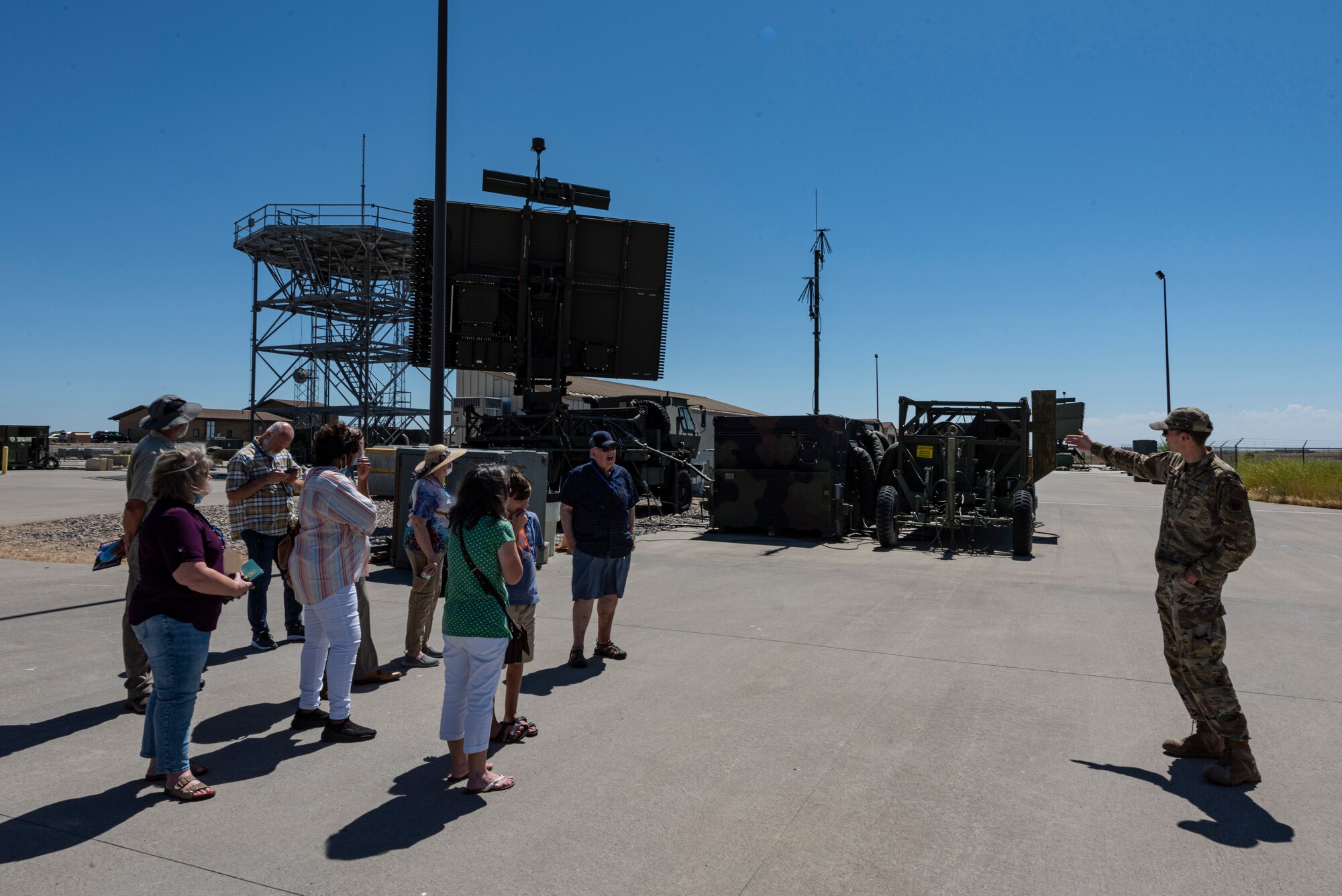 A radar airfield weather systems technician, describes the equipment his unit uses day-to-day and while downrange to a group of local faith leaders.