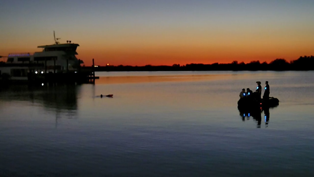 Marines with Marine Forces Special Operations Command conduct a nighttime dive during RAVEN, May 26, 2022. RAVEN is a training exercise held to evaluate all aspects of a Marine Special Operations Company prior to a special operations deployment. (U.S. Marine Corps photo by Lance Cpl. Brandon Marrero)