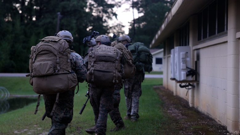 Marines with 4th Reconnaissance Battalion integrate with Marine Forces Special Operations Command to conduct a reconnaissance insert during RAVEN, May 22, 2022. Marines from units across the Fleet Marine Force and Marine Corps Forces Reserve supported RAVEN in various roles throughout the exercise. RAVEN is a training exercise held to evaluate all aspects of a Marine Special Operations Company prior to a special operations deployment. (U.S. Marine Corps photo by Lance Cpl. Brandon Marrero)