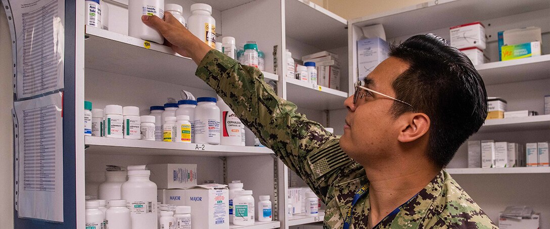 hospital corpsman organizes pharmacy medication