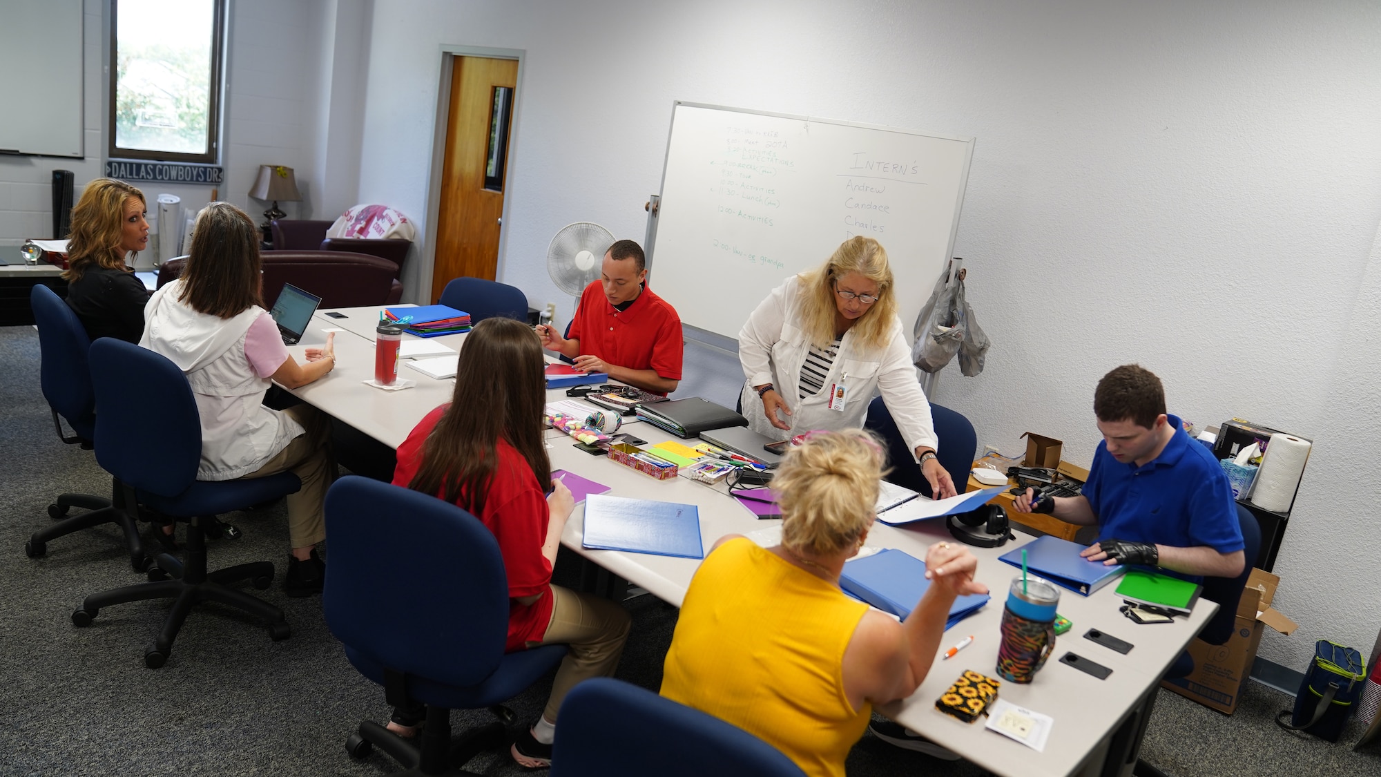 Biloxi students and educators participate in an onboarding session for the first day of Project SEARCH internship training at Keesler Air Force Base, Mississippi, August 8, 2022. Keesler is the third Air Force base to partner with Project SEARCH, a program that places high schoolers with disabilities as interns at governmental and non-governmental organizations to learn critical job skills.