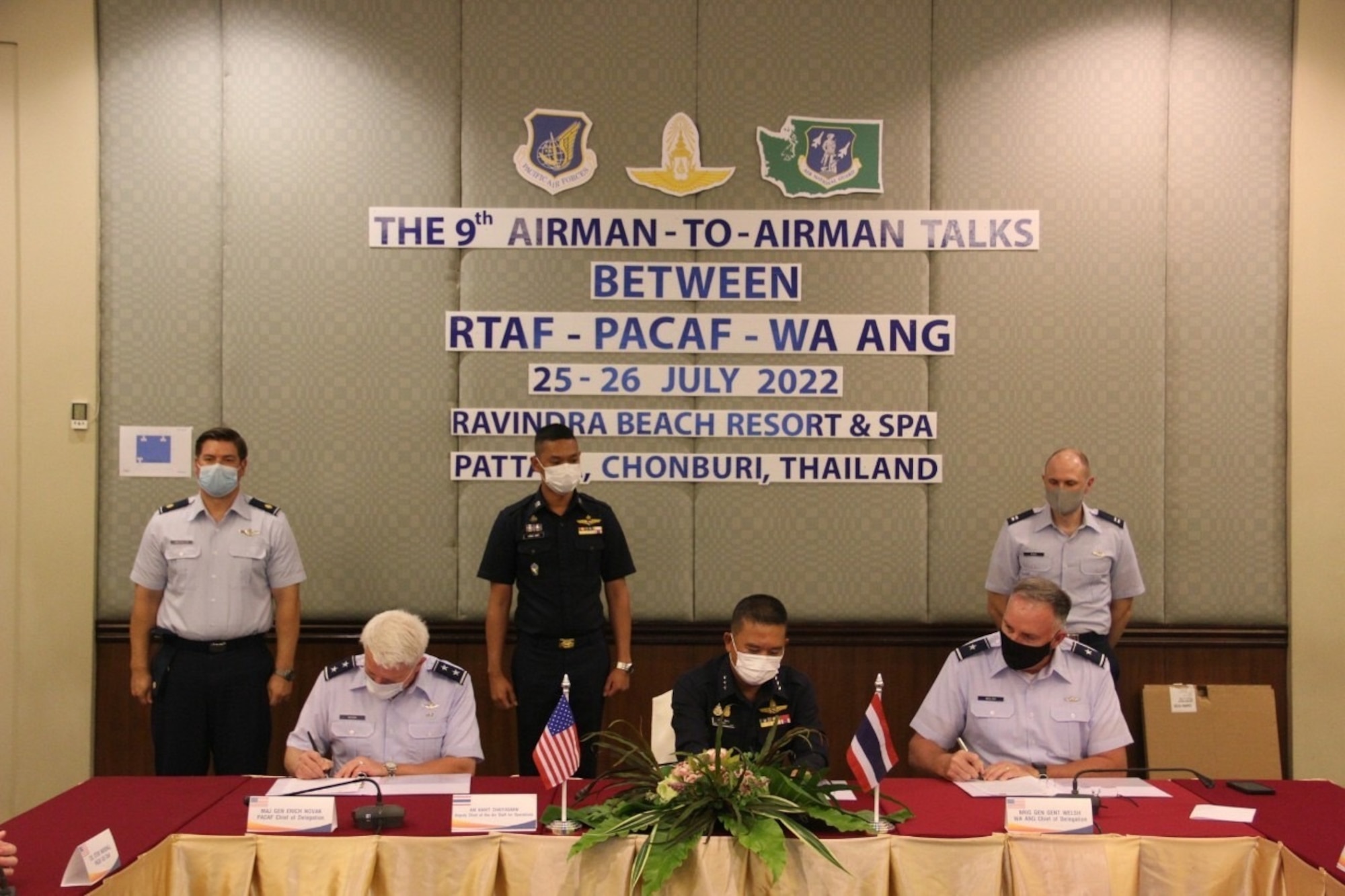 U.S. Air Force Maj. Gen. Erich Novak, Mobilization Assistant to the Commander, Pacific Air Forces, Royal Thai Air Force Air Marshal Kanit Chaiyasarn, Deputy Chief of the Air Staff, and U.S. Air Force Brig. Gen. Gent Welsh, Washington Air National Guard commander, sign the final minutes for the ninth annual Airman-to-Airman Talks, Pattaya, Thailand, July 29, 2022. The overall objectives of these Airman-to-Airman Talks is to strengthen the relationship among the two nations to review the effectiveness of exercise and engagement programs; and to strengthen interoperability. (Courtesy photo)