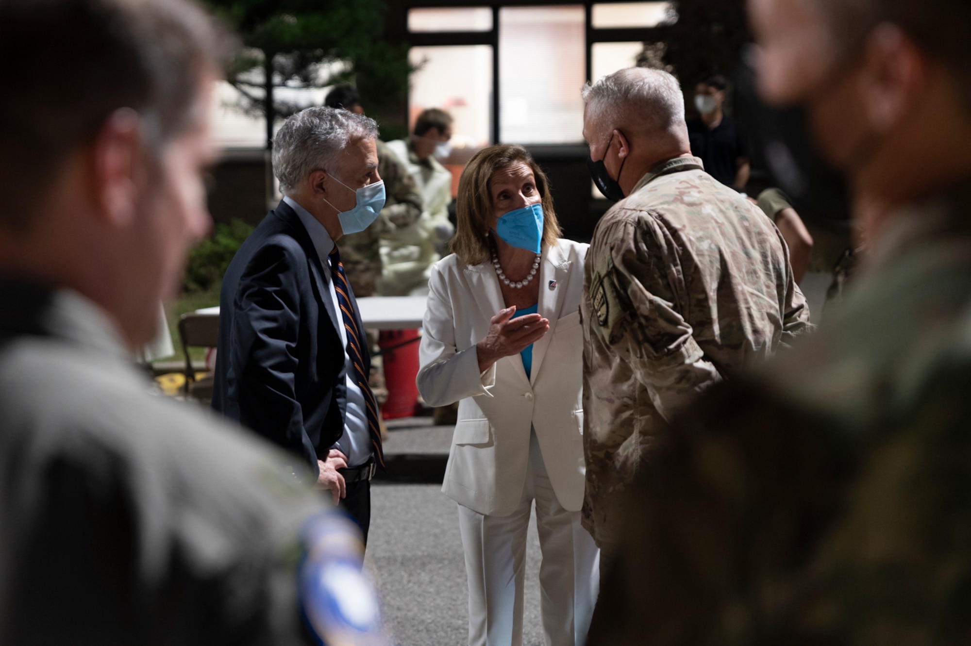 Nancy Pelosi, speaker of the U.S. House of Representatives, and Philip Goldberg, U.S. Ambassador to the Republic of Korea, speaks with U.S. Army Gen. Paul J. LaCamera, United States Forces Korea Commander, at Osan Air Base, Republic of Korea, Aug 3, 2022.