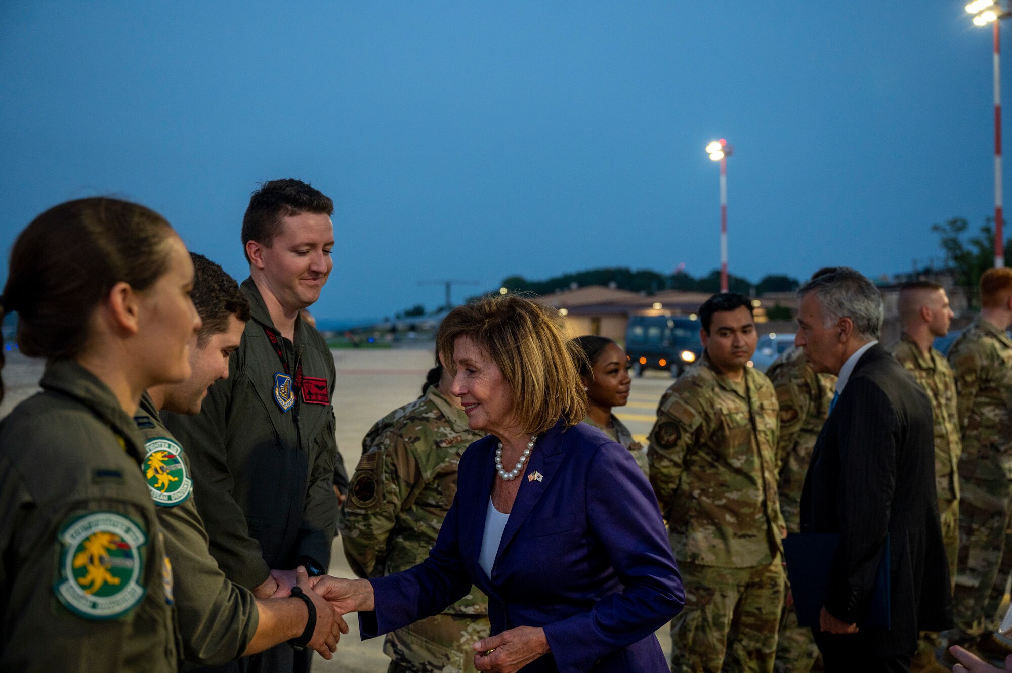 Nancy Pelosi, Speaker of the U.S. House of Representatives, and Philip Goldberg, U.S. Ambassador to the Republic of Korea, greet U.S. service members at Osan Air Base, ROK, Aug. 4, 2022.