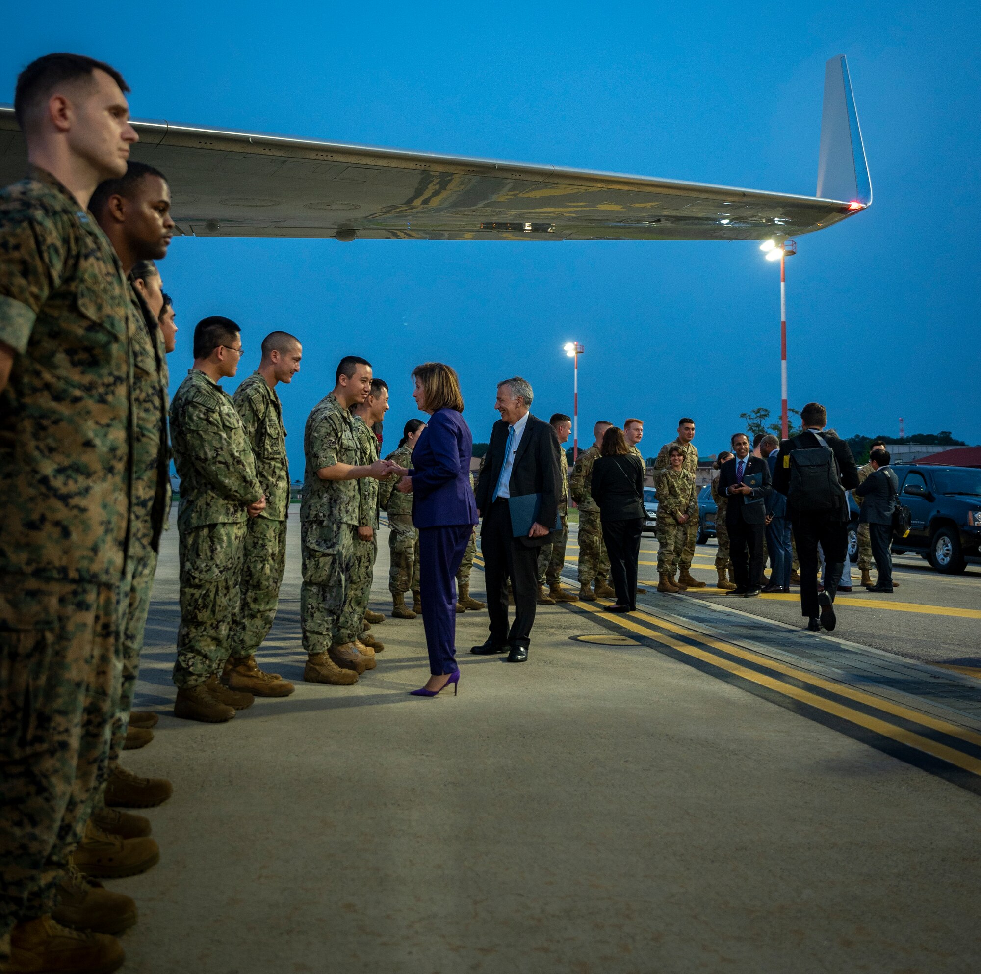 Nancy Pelosi, Speaker of the U.S. House of Representatives, and Philip Goldberg, U.S. Ambassador to the Republic of Korea, greet U.S. service members at Osan Air Base, Republic of Korea, Aug. 4, 2022.