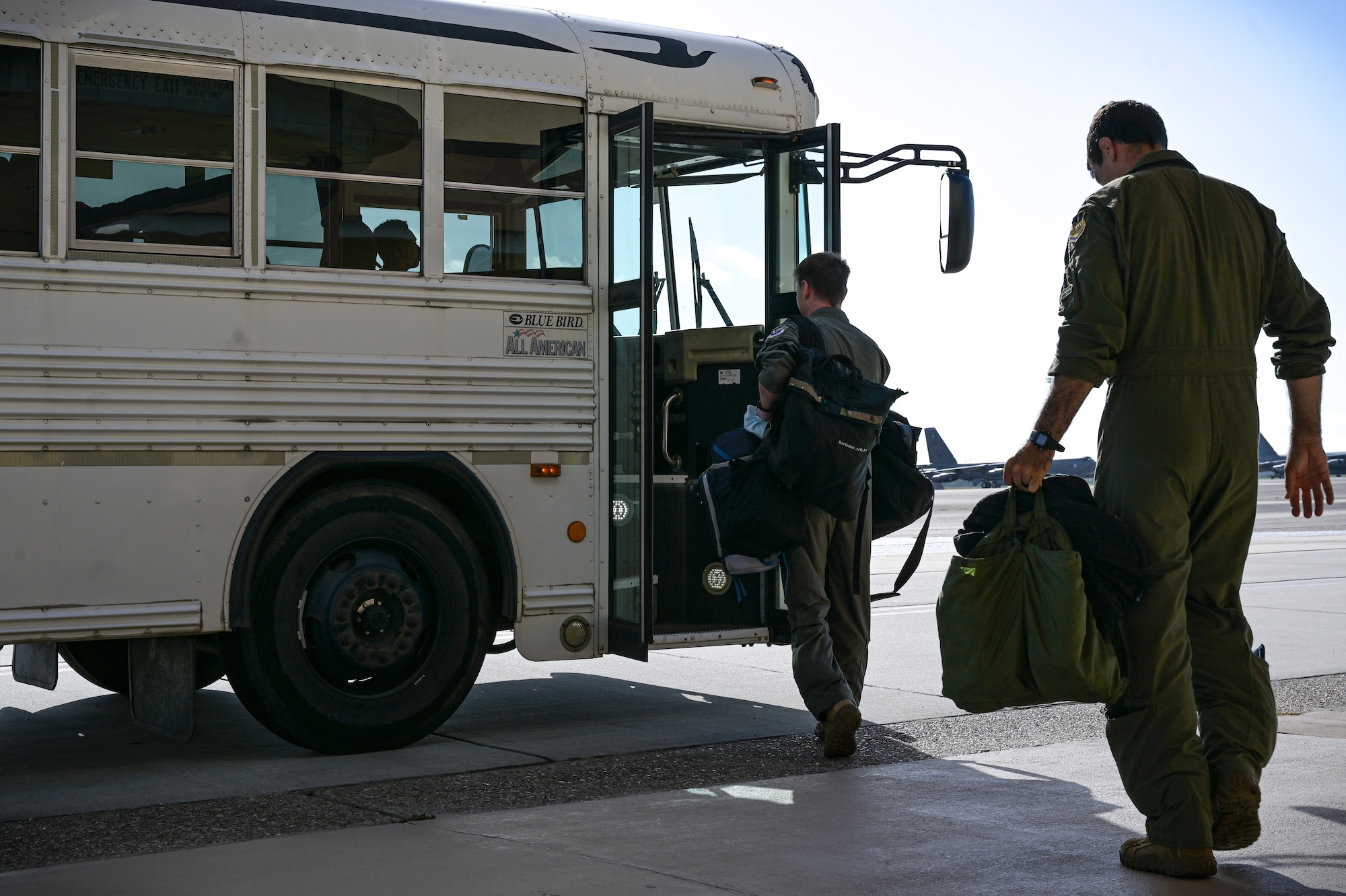 Aircrew from the 20th Bomb Squadron board a ground transportation bus before stepping to a B-52H Stratofortress in support of RIMPAC 2022 at Barksdale Air Force Base, Aug. 1, 2022. Twenty-six nations, 38 ships, three submarines, more than 170 aircraft and 25,000 personnel are participating in RIMPAC from June 29 to Aug. 4 in and around the Hawaiian Islands and Southern California. The world’s largest international maritime exercise, RIMPAC provides a unique training opportunity while fostering and sustaining cooperative relationships among participants critical to ensuring the safety of sea lanes and security on the world’s oceans. RIMPAC 2022 is the 28th exercise in the series that began in 1971. (U.S. Air Force photo by Senior Airman Jonathan E. Ramos)