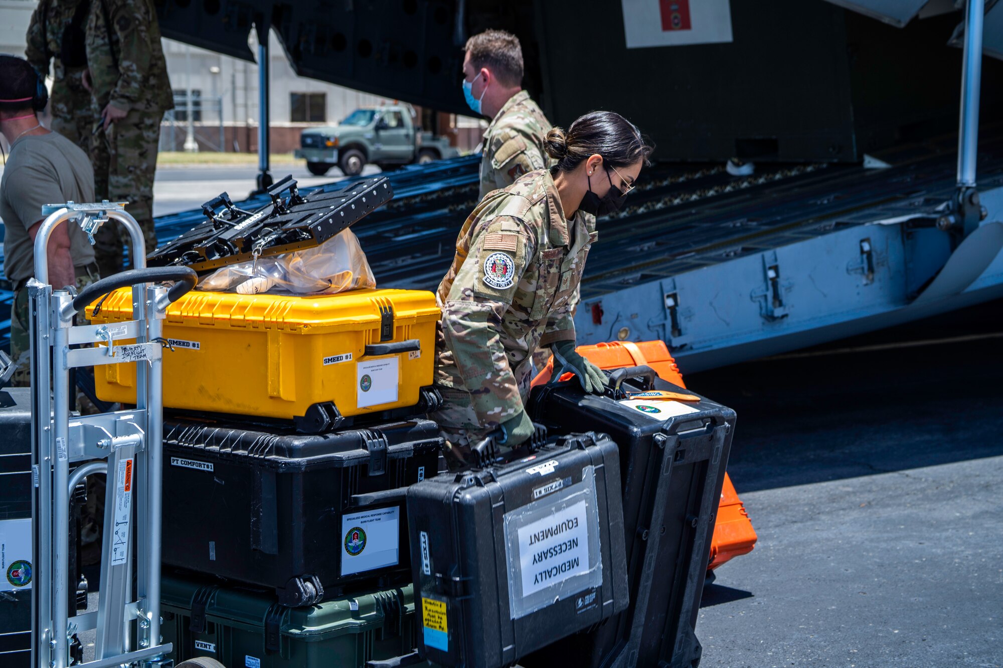 Staff Sgt. Abigail Rodriguez, 18th
Aeromedical Evacuation Squadron,
Detachment 1, Noncommissioned officer in
charge, loads medical equipment for an
Aeromedical Evacuation Mission at Joint
Base Pearl Harbor-Hickam, Hawaii, July 27,
2022. The primary mission of the 18th AES
is to support medical operations in the Indo-
Pacific region during wartime, various
contingencies, and natural disaster relief
operations. (U.S. Air Force photo by Senior
Airman Makensie Cooper) (Image altered
for PII purposes)
