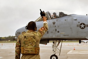 U. S. Air Force Airmen from the 127th Aircraft Maintenance Squadron, Selfridge Air National Guard Base, (SANGB) Mich. perform Agile Combat Employment (ACE) training while loading bombs onto an A-10 Thunderbolt II also from SANGB during an Integrated Combat Turn (ICT) during Northern Agility 22-2/Northern Strike 22, at Cherry Capital Airport in Traverse City, Mich., Aug. 8, 2022.