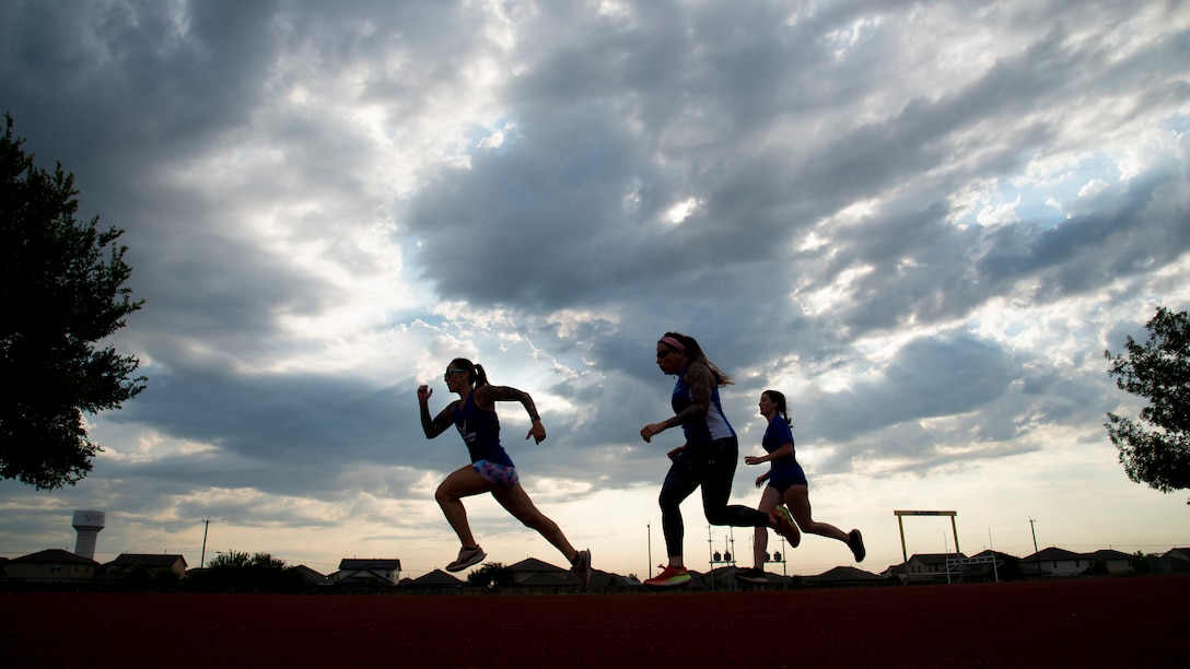 RSMs warm up for track practice.