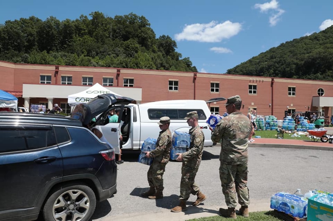 The Soldiers are part of a point of distribution site at Letcher County Central High School.