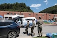 The Soldiers are part of a point of distribution site at Letcher County Central High School.