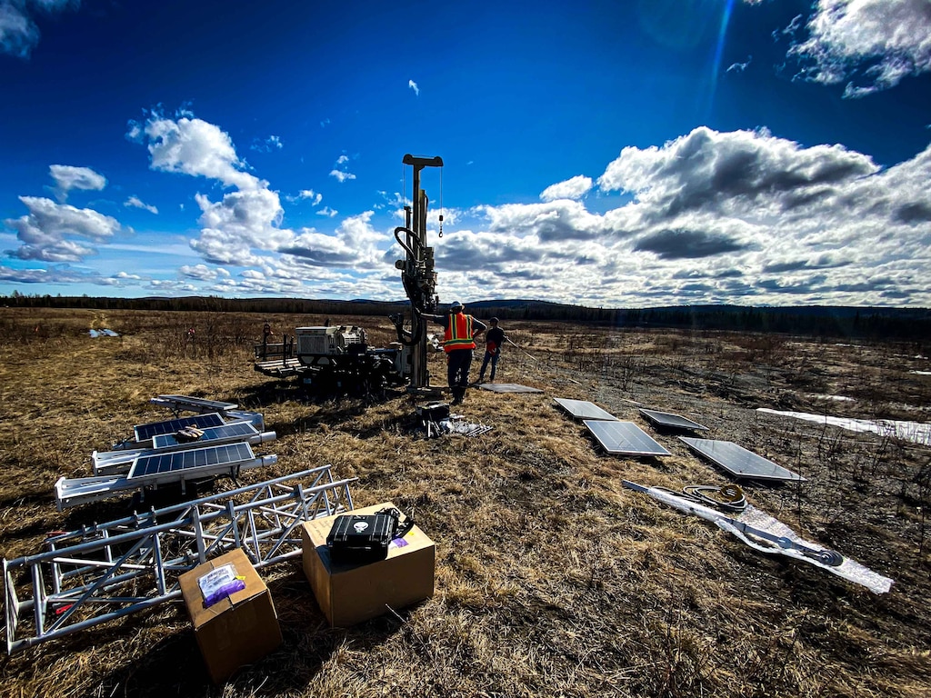 Two researchers with the U.S. Army Engineer Research and Development Center’s Cold Regions Research and Engineering Laboratory assemble a newly engineered automated terrestrial laser scanning system (A-TLS) at Husky Drop Zone on Eielson Air Force Base, Alaska. The A-TLS is installed on a 12-foot-tall tower affixed with multiple lidar laser scanners, meteorological sensors and solar panels.