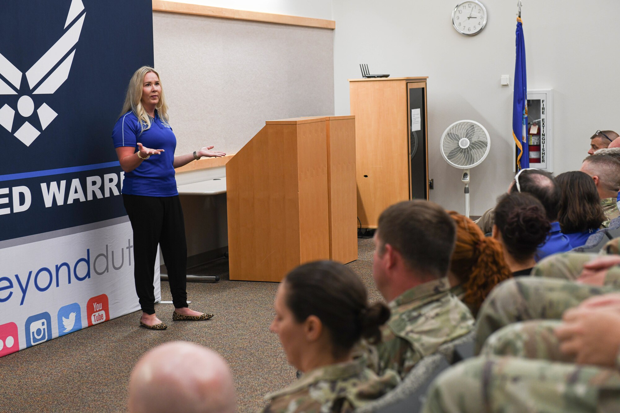 Melissa Wiest, Air Force Wounded Warrior program staff member, briefs Airmen and Guardians about their mission at Whiteman Air Force Base, Missouri, August 9, 2022. The Air Force Wounded Warrior Program ambassadors and staff speak about their program aiming to provide a refined, simplified transition back to duty or in civilian life for service members.